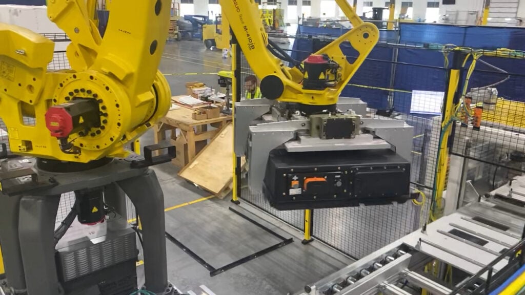 A robotic arm with a battery storage module at the Fluence factory in Utah, US.